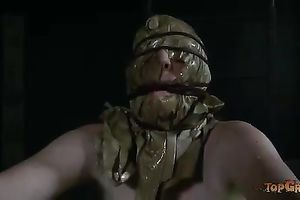 Bosomy doxy with a bag on her face is bounded with ropes and tortured
