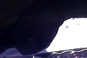 An upskirt video of a bulky and voluptuous dark housewife