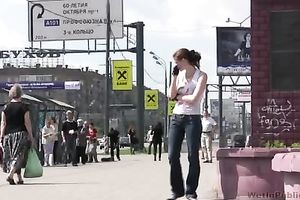 Amateur black cock sluts disrobes down to her pants in the park