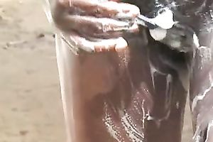 Black sexy youthful wife with shaggy snatch shaves herself outside