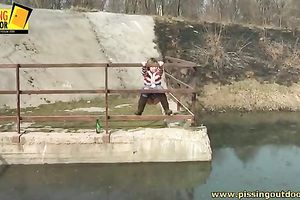 Naughty Married slut with bald cookie urinates near the river