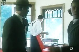 Sizzling milf teases 2 men with her pretty legs