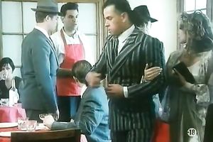 Sizzling milf teases 2 men with her pretty legs