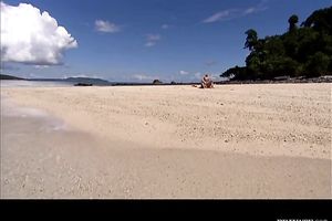Sizzling hot golden-haired with magnificent mounds blows weenie on the beach