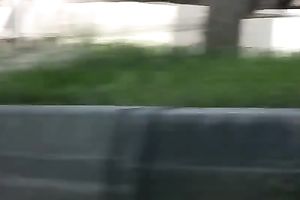 Long-haired slut Olga pees her trousers in the street