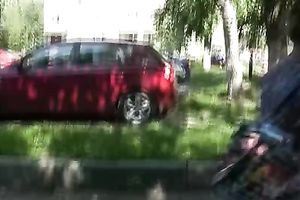 Long-haired slut Olga pees her trousers in the street