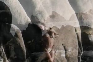 Breath-taking chick Racquel posing undressed on a beach