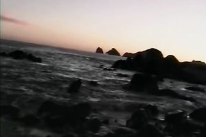 Breath-taking chick Racquel posing undressed on a beach