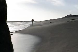 Breath-taking chick Racquel posing undressed on a beach