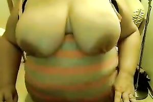 This obese charmer enjoys showing off her giant saggy titties