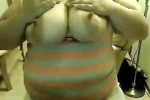 This obese charmer enjoys showing off her giant saggy titties