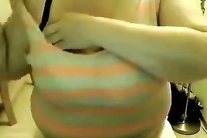 This obese charmer enjoys showing off her giant saggy titties