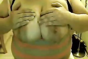 This obese charmer enjoys showing off her giant saggy titties