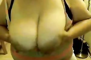This obese charmer enjoys showing off her giant saggy titties