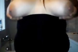 This bulky whore can't live without playing with her large adorable boobies