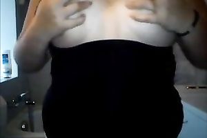 This bulky whore can't live without playing with her large adorable boobies