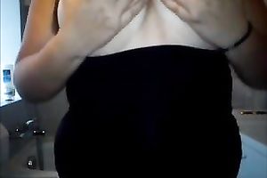 This bulky whore can't live without playing with her large adorable boobies