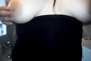 This bulky whore can't live without playing with her large adorable boobies