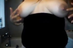 This bulky whore can't live without playing with her large adorable boobies