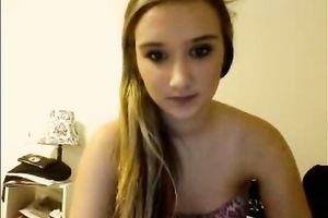 Blonde teenage sweetie talks on livecam and takes all her raiment off