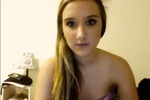 Blonde teenage sweetie talks on livecam and takes all her raiment off