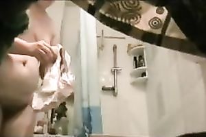 My corpulent slutty wife had no idea I was watching her in the bath
