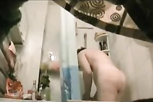 My corpulent slutty wife had no idea I was watching her in the bath