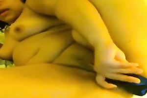 Chubby legal age teenager skank in glasses slams her crotch with a sex toy