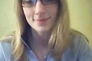 Filthy blond whore with glasses pokes her bawdy cleft with dildo