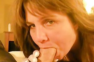 Brown-haired next-door milf admires me with her cock-sucking skills