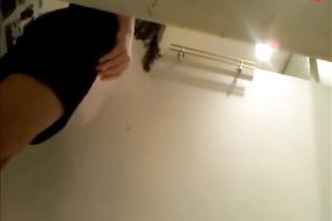 Spying on hot dark brown white bitch in a changing room in the shop
