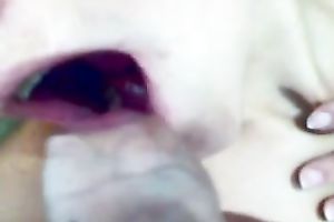 Attractive babe sucks my dick and receives a mouthful of cum