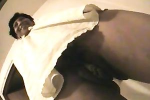 Shameless hoe in dark petticoat flashes her bald pussy