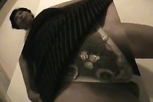 Shameless hoe in dark petticoat flashes her bald pussy