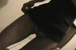 Shameless hoe in dark petticoat flashes her bald pussy