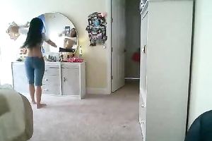Shapely dark brown enchantress shows off her well-shaped butt