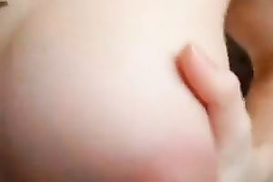 Busty redhead girlfriend with large pierced teats topless