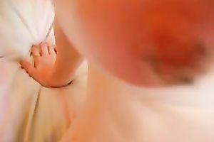 Busty redhead girlfriend with large pierced teats topless