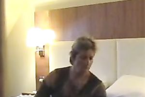 Hidden webcam movie with a blond mamma fingering her bawdy cleft in a hotel room