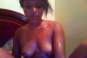 Delicious and shiny dark legal age teenager hottie greases up and masturbates