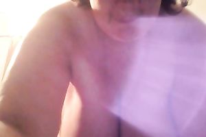 Fat slut is licking her massive pillowy love melons with excitement