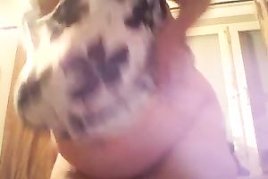 Fat slut is licking her massive pillowy love melons with excitement