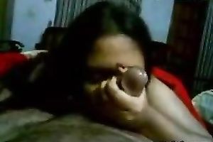 Slutty Indian maid with unattractive smile is sucking hard penis of a landlord