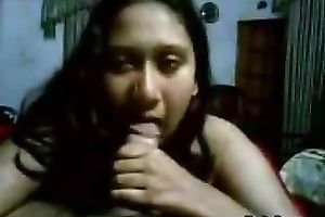 Slutty Indian maid with unattractive smile is sucking hard penis of a landlord