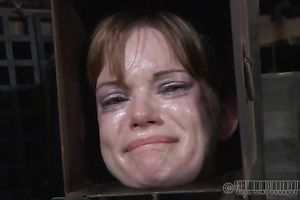 Raunchy looking hoe can not unlock and remove that metal box on her head