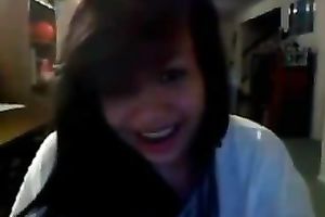 Playful Asian hottie flashes her gorgeous breasts on web camera