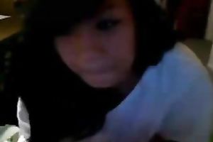 Playful Asian hottie flashes her gorgeous breasts on web camera