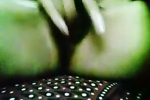 Webcam solo act with a woman showing her bumpers and rubbing her cookie