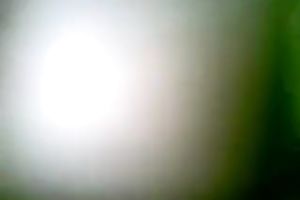 Webcam solo act with a woman showing her bumpers and rubbing her cookie