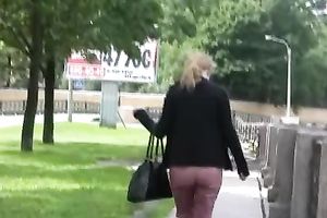 Lena changes her trousers after peeing her panties in the street